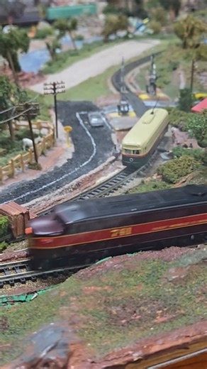 In scale Alco PA and CSX Y2 GP40 on a layout at the Heartland toy train show, 2025