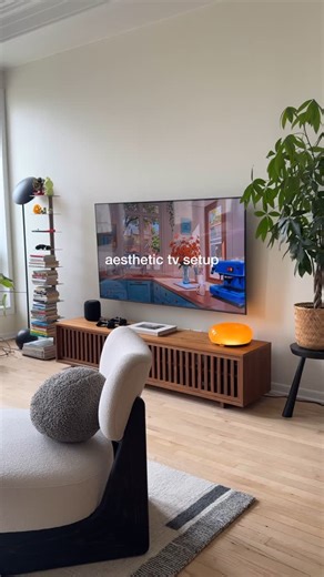 andrew maddock on Instagram: "some tips for an aesthetic tv setup: - find the proper height to mount your tv by measuring your seated eye level, this should be the center of your tv - run your cables through the wall with a cable management grommet kit - make sure your console is proportionate to your tv, leaving at least 7” of clearance on either side (my tv is 65” for reference) - never watch tv with the big light! cozy lights only ✨ #home #homedecor #interiordesign #tv #livingroom"