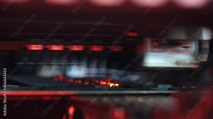 Close-up automated electronic circuit board production. Machine robot produces digital board. Manufacture production of electronic chips. Assembling with robotic arm. Automatic SMT pick and place