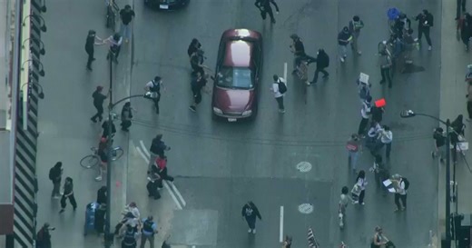 Multiple arrests, skirmishes with police at Chicago immigration protest