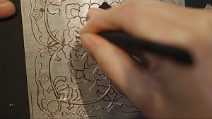 33K views · 73 reactions | "Carving with silver threads" is a traditional craft in which metal foil serves as the canvas. A special hooked knife is used to create intricate patterns by carving, scoring, cutting and scraping. The process seamlessly integrates the metal foil with the lacquerware while preserving the fluidity and integrity of the design. | CGTN | Facebook