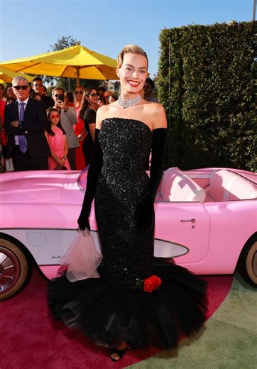 Margot Robbie • CelebMafia