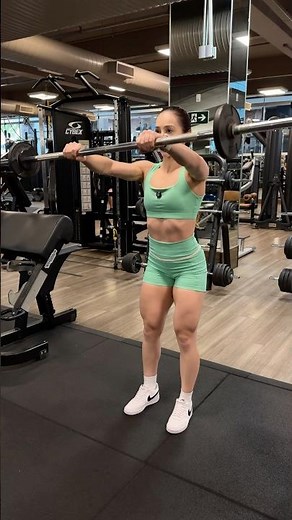 Front Raise with Barbell - Learn how to perform it correctly.