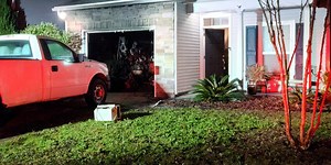 Resident injured while battling garage fire