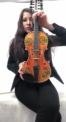 Lark In The Morning on Instagram: "🎻✨ Meet the Hardanger fiddle / Hardingfele, Norway’s national treasure! 🎶 With four bowed strings and four sympathetic strings, it creates a rich, resonant sound that feels both melodic and hauntingly drone-like. Traditionally adorned with delicate artwork, mother of pearl, or bone inlays, it is often crowned with a dragon or lion head scroll. The Hardingfele is as stunning to look at as it is to hear. https://larkinthemorning.com/products/deluxe-fancy-norweg