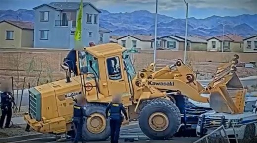 Video shows man attempting to run over Henderson officers with stolen construction vehicle