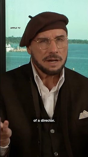 John Travolta speaks to CNN about his Cannes beret look