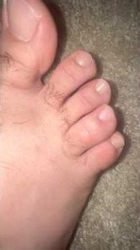 Giant male feet and toes super close up