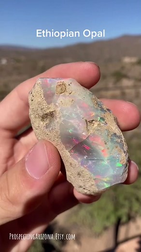 This is a large Ethiopian opal which we just sold. Look at its flashes of color! #opal #opals #gems #gemstones #crystal #crystals #gem #opalrough