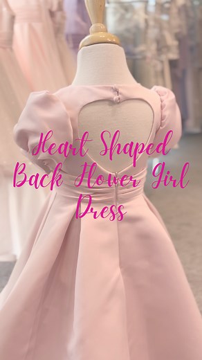 The cutest flower girl dress! 🩷🌸 In shimmering satin this dress is ever so pretty with its puffy cap sleeves and pleated full satin skirt. 🩷 The back features a statement heart shaped cut out, secured with two satin buttons. 🫶🏻✨ Perfect for a little princess! 👑🩷 #EB12554 #emmabridals #flowergirldress #flowergirl #wedding #weddingplanning #girlsdress #flowergirldresses #girlsdresses #flowergirls #weddinginspiration #weddingday #weddinginspo #childrensclothing #weddings #weddingideas #princ