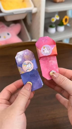 2.3K views | Steal a childs sticker and fold him a pair of mini slippers #paper #howto #crafts #papercraft #origami | People Crafts | Facebook