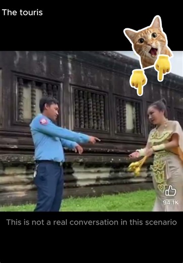Tourist wears Thai dress at Angor Wat