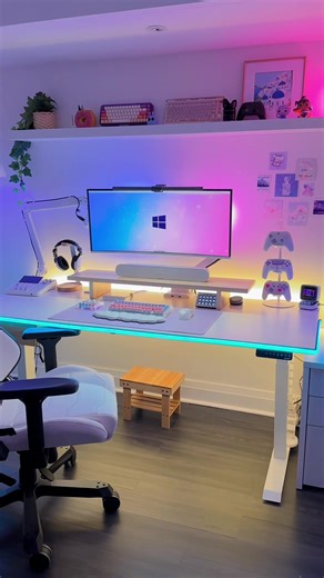 Cozy Gaming Desk Setup with RGB Lights and White Decor