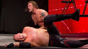 Edge captures Kane's World Heavyweight Championship in a brutal Fatal 4-Way TLC Match