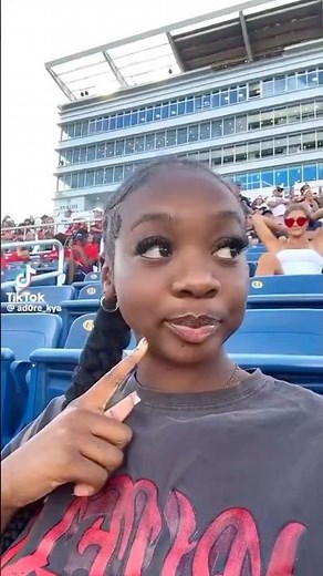 Girl biting her finger and laughing meme