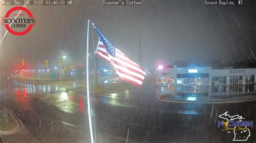 Grand Rapids & Surrounding Areas - Update as of 1:53 am EST Our weather camera at Scooter's Coffee in Grand Rapids off of Plainfield Ave is showing an unfavorable scene for morning travel. For most areas, the dry slot was able to work its magic in clearing main roads of water. However, in Grand Rapids, because the temperature didn't drop fully below 32°F prior to our lake effect kicking in right around 1:30 am EST, this precipitation around Grand Rapids has been, and is still falling as a rain/s