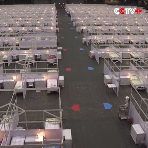 Hong Kong's Converted Temporary Hospital Opens to COVID-19 Patients As Hong Kong has recorded more than 3,000 coronavirus cases, its Asia World-Expo has been converted into a temporary hospital for COVID-19 patients, and opened to use from Saturday noon on. The expo center provides about 500 beds in Hall One for patients aged between 18 and 60 with mild symptoms. http://www.cctvplus.com/news/20200801/8152204.shtml#!language=1 | CCTV