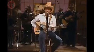 Mondays With Merle: Footlights I live the kinda life most men only dream of I make my livin' writin' songs and singin' them But I'm forty-one years old and I ain't got no place to go When it's over So I hide my age and make the stage and Try to kick the footlights out again I throw my old guitar across the stage and Then my bassman takes the ball And the crowd goes nearly wild to see My guitar nearly fall After twenty years of pickin' we're still alive And kickin' and kickin' down the wall Tonig