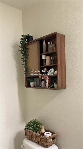 Myra 🎀 on Instagram: "✨ The perfect bathroom cabinet for perfumes ✨ Keeps your favorite scents organized, visible, and protected while elevating your bathroom decor 🤍 ✨ Sleek, space-saving design 🏡 Perfect for small bathrooms & vanities 💫 Functional storage with an aesthetic touch 📦 Comment “PERFUME” for the link or check my bio ✨ 🎥jademattingly TikTok #bathroomcabinets #perfumestore #perfumestorage #bathroomideas #bathroomorganization"