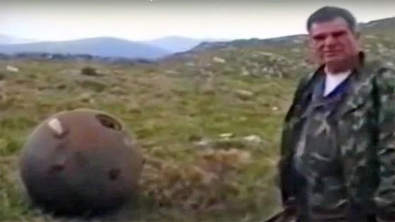 Soldiers Push Giant Naval Mine off Mountain to Blow Up Enemies Below
