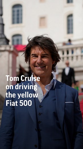 Tom Cruise describes his "crazy" experience trying to drive the yellow Fiat 500 in "Mission Impossible." | AP