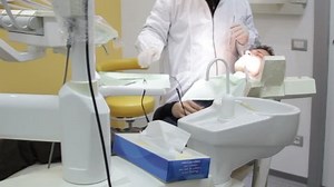 Patient open mouth during oral checkup