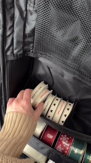 Here’s the link https://amzlink.to/az0jLvt919FM7 for this rolling gift wrap organizer from Amazon! It holds up to fourteen 40" rolls of wrapping paper and has sooo many pockets for things like bows, gift boxes, pens, scissors, etc! 🎁🎄 #wrappingpaper #amazonhome #organizedhome #christmaswrapping #holidayhome #asmrsounds #asmr #thesistershoppers #christmasgifts #organizationideas | The Sister Shoppers