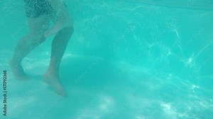 Couple playing and kissing romantically in the pool underwater Stock Video