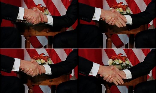 Macron and Trump's two tense handshake battles – video