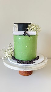 🎓 Graduation Cake Perfection 🎓 Celebrating achievements, one slice at a time 💚 This elegant graduation cake was designed with a soft green buttercream finish, delicate pearl details, fresh florals, and a classic graduation cap topper — simple, classy, and meaningful. Every cake I create is custom-designed, freshly baked, and made to make your special moments unforgettable ✨ 📍 Charlotte, NC 📩 DM to book your custom cakes 🎂 Perfect for graduations, birthdays & milestones Save this for gradua