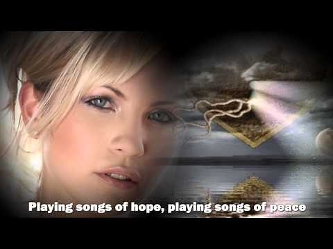 Bette Midler - From A Distance - lyrics