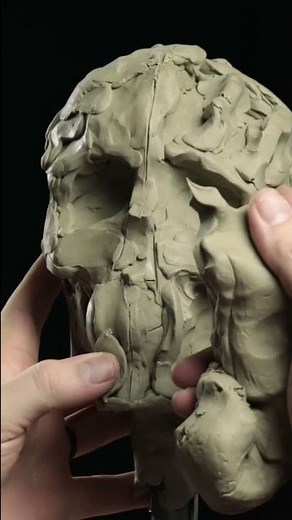 Sculpting a life size skull in clay