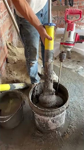 Manual Cement Grouting Process for Strong Brick Wall Construction