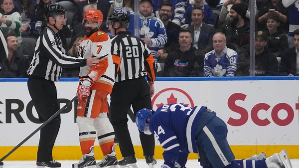 Auston Matthews helped off ice after hit to knee