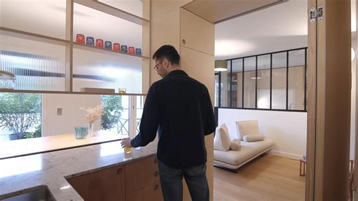 This Paris apartment has a kitchen behind doors - and it’s genius