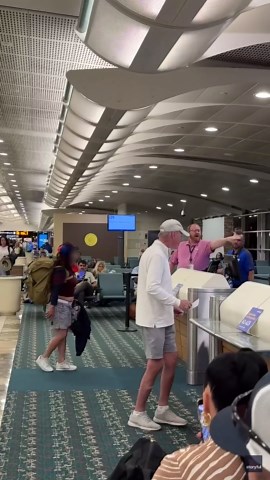 Woman Screams at and Attacks Airport Staff in Wild Outburst