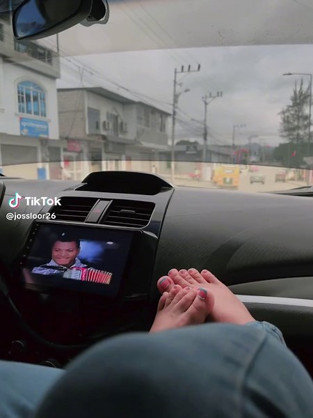 Dashboard Relaxation: Feet on the Car's Dashboard