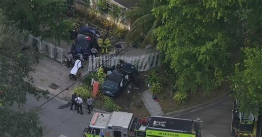 Four hospitalized after two‑car crash sends vehicles into North Miami yard