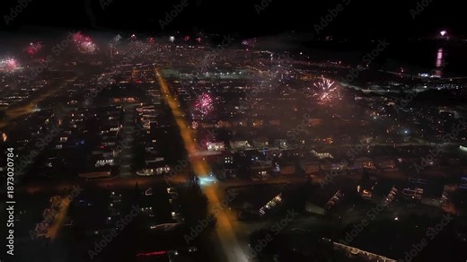 Aerial View of Fireworks Over City Skyline