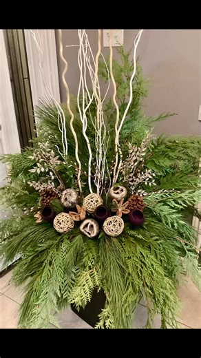 This Christmas planter looks stunning! 🎄💚 I’ve got a gorgeous mix of evergreen branches, weny balls, pinecones, and twigs creating a festive vibe. The neutral tones with pops of brown and the natural textures make it super cozy. Percfect spot to place front Door / Garage Door or Porch display outdoor for some holiday cheer! 😊 Do you want me to help with ideas on how to style more planters like this or maybe suggest variations for different spaces? Comment ⬇️ #christmasplanters #wintercontaine