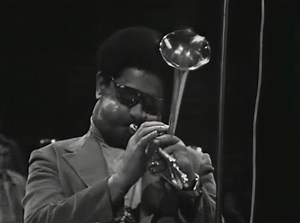 Dizzy Gillespie - Con Alma (Live) (1954) "Dizzy Gillespie's 'Con Alma,' composed in 1954, is a masterful blend of jazz and Afro-Cuban rhythms, embodying a deep emotional and cultural resonance. The title, meaning 'With Soul,' reflects the piece's rich sonic landscape, marked by its contemplative and introspective qualities. Unlike his typical high-velocity bebop style, Gillespie adopts a melodic approach in 'Con Alma,' allowing for a more nuanced expression. The composition begins with a poignan