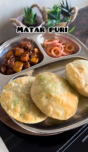 Stuffed Matar puri ✅Save the recipe and try it later ✅Recipe details: Puri Dough: Mix 1 cup wheat flour,1/2 cup refined flour/maida,1 tbsp rava,salt,carrom seeds,1 1/2 tbsp oil and make a semi soft dough Filling: In a mixer jar add fresh green peas,cumin and make a fine paste Now in a Kadhai add some oil and transfer this paste Add a pinch of turmeric powder and salt as per taste Cook this mixture really wellAfter it’s completely cool,make a small balls out of it Now take the dough and make smal