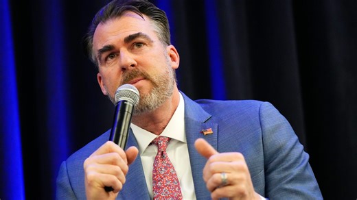Gov. Stitt urged ethics board to act on issues with campaign finance system