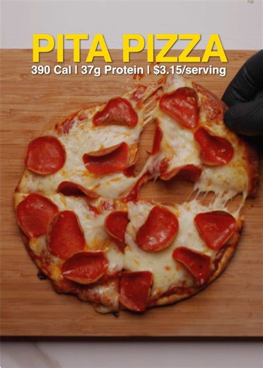 Recipe below 👇 PITA PIZZA 390 Calories | 37g Protein | $3.15 Ingredients Pita Bread 1x | 37g Tomato Sauce 3 tbsp | 42g Low-Moisture Part Skim Mozzarella ¾ cup | 84g Turkey Pepperoni 17x | 30g Dried oregano, garlic powder Directions 1. Preheat your oven or air fryer to 400°F (205°C). 2. Spread the tomato sauce evenly over the pita bread and sprinkle with oregano and garlic powder. 3. Top with the cheese and pepperoni. 4. Bake or air fry for 6 minutes until the cheese is melted and bubbly. #fyp