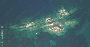 Aerial view from drone on underwater reefs in mediterranean sea near Kalo Horafi and Vrahi beaches with clear transparent water. Crete, Greece, Rethymno prefecture. View from drone.