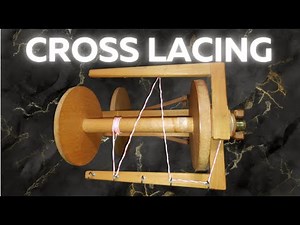 Learn how to cross lace an Irish tension spinning wheel. Excerpt from Spinning Consistent Singles
