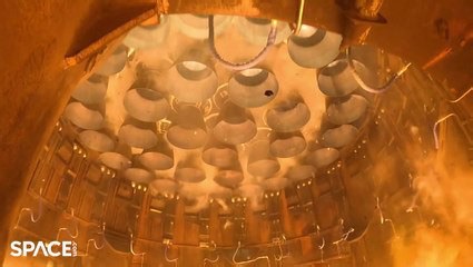 See SpaceX Starship lift off from beneath in launch mount view