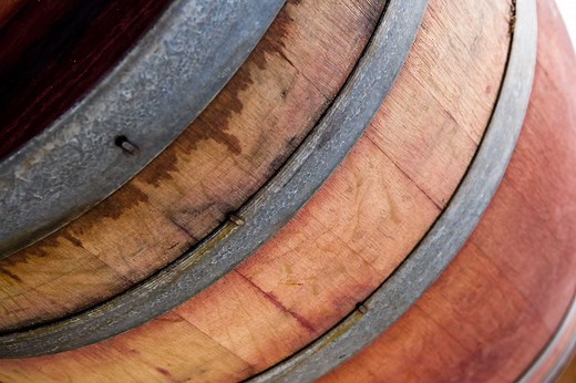 How to Fasten a Glass Tabletop to a Wine Barrel