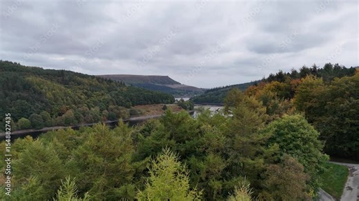 Witness the impressive Lockwood Viaduct in Huddersfield, West Yorkshire, England. This historic stone railway bridge majestically spans the River Holme, showcasing Victorian engineering. Stock Video