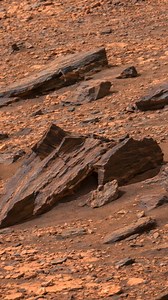 This structure on the surface of Mars looks like a cave or hole, located millions of kilometers away from Earth. Scientists explain that these features are usually lava tubes or collapsed underground caverns formed by ancient volcanic activity. When lava flowed under the surface long ago, it created tunnels. Over time, parts of the roof collapsed, leaving cave-like openings. These caves are important because they may provide natural shelter from radiation and extreme temperatures, making them in